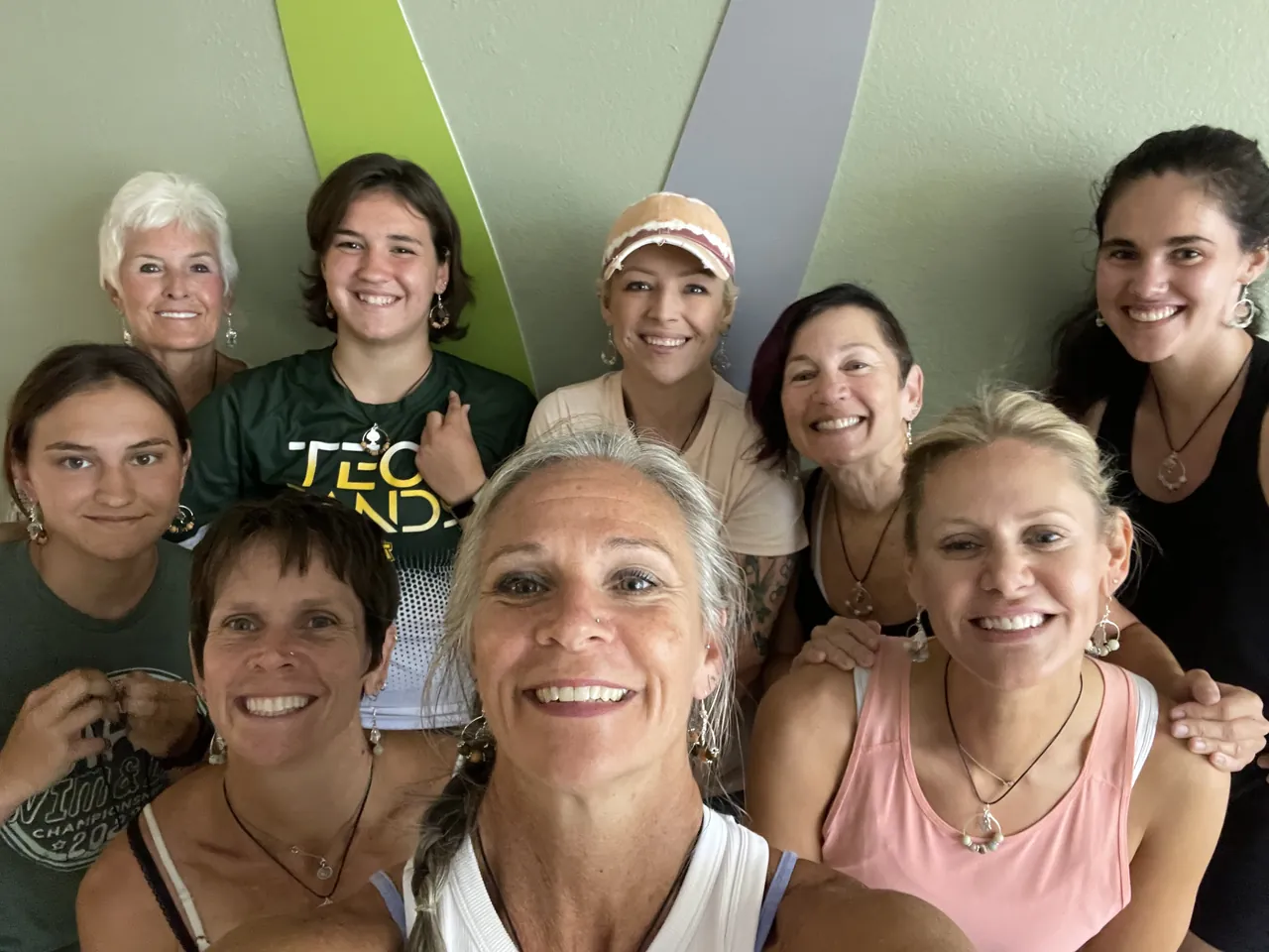 Jill and students gathered for a group selfie after class.